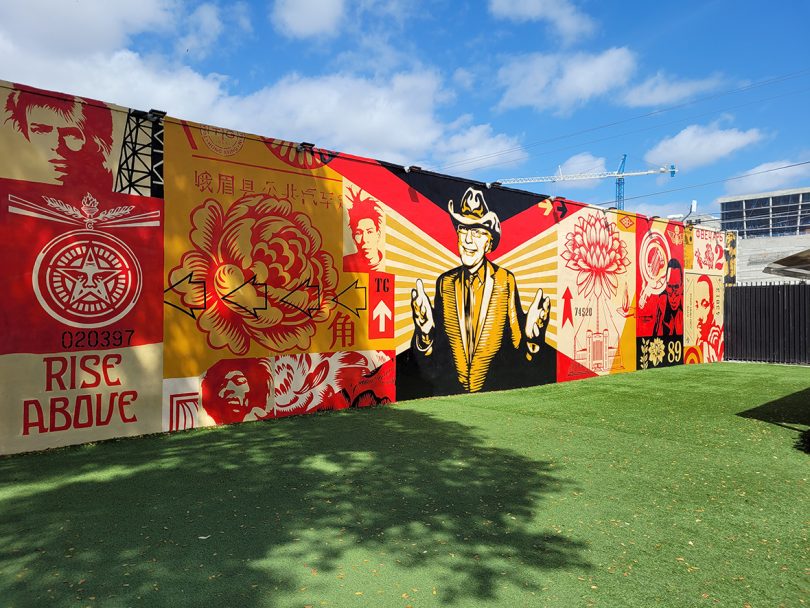black, white, red, and yellow street art mural