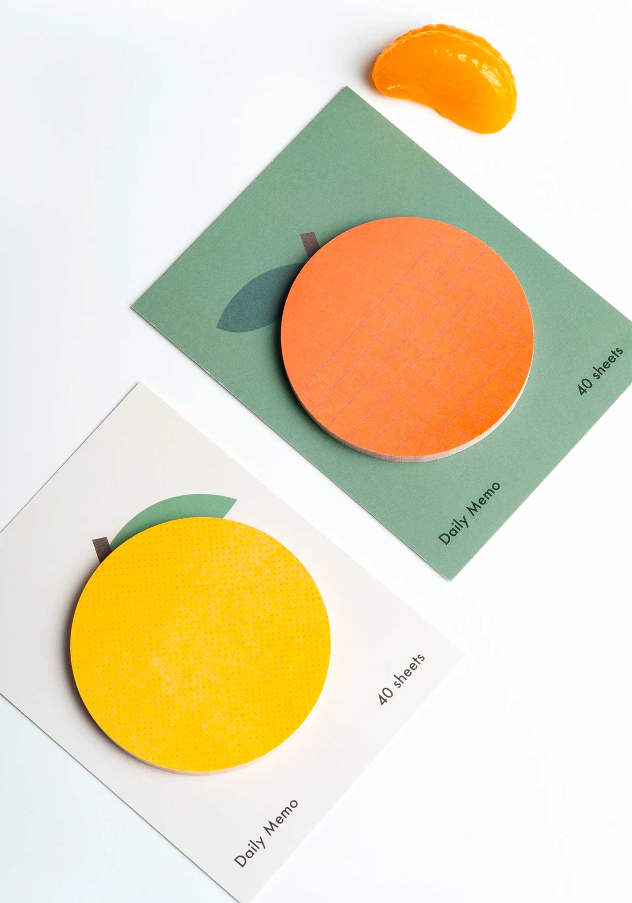 orange and lemon packs of sticky notes