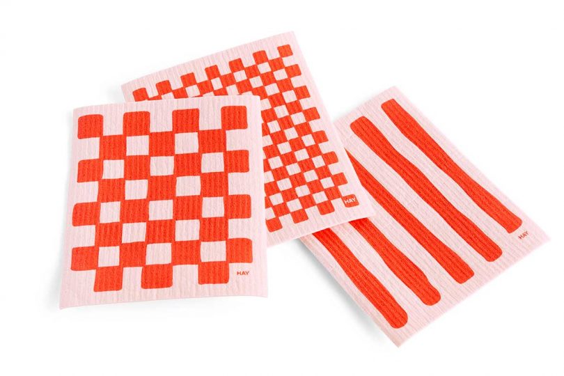 three sponges in red and pink checkerboard and stripes
