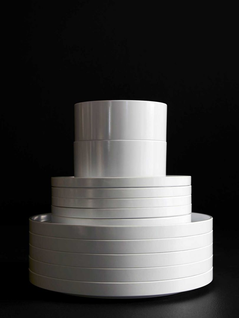 stack of white Heller plastic dinnerware