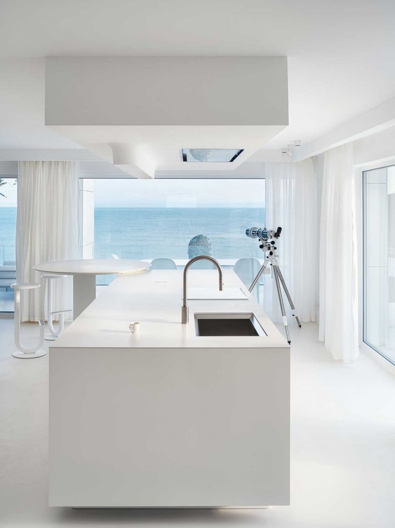 kitchen of minimalist interior of modern white house
