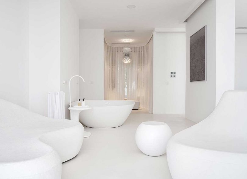 large white bathroom of minimalist all-white modern house