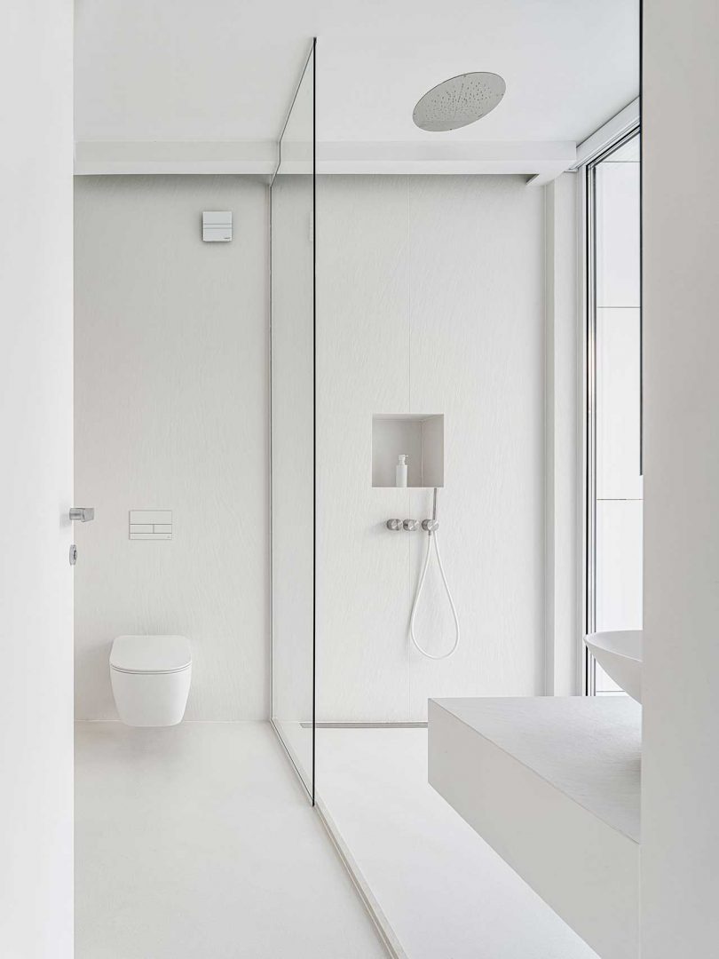 bathroom of of minimalist all-white modern house