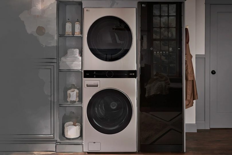 Modern stainless steel stacked washer and dryer laundry room