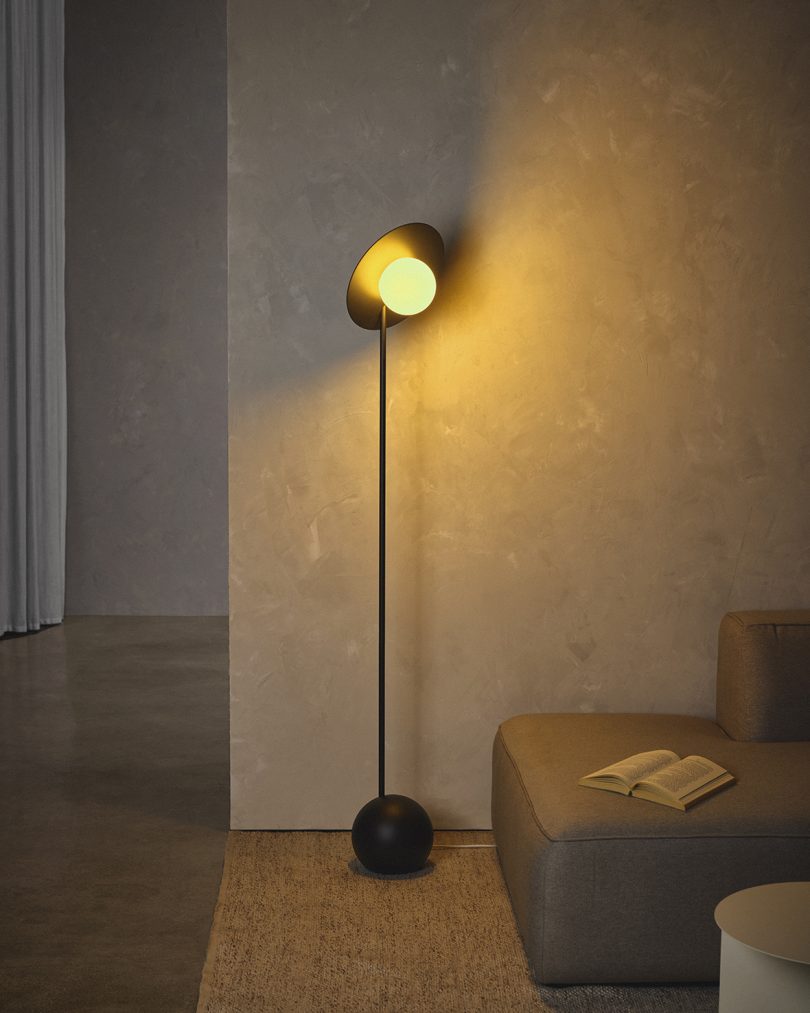 modern black floor lamp in styled living space