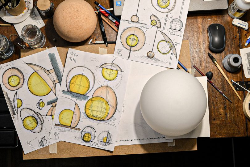 sketches on modern table lamp on desk