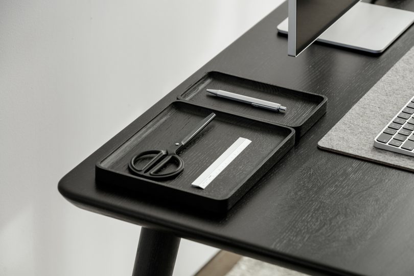 styled dark wood and black office desk