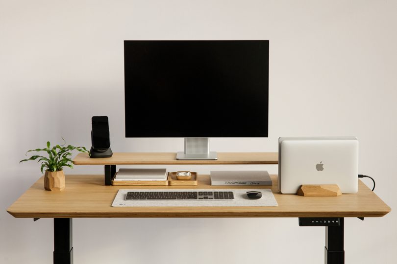 styled light wood and black office desk