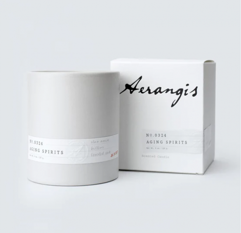 light grey jar candle with accompanying white box that reads Aerangis