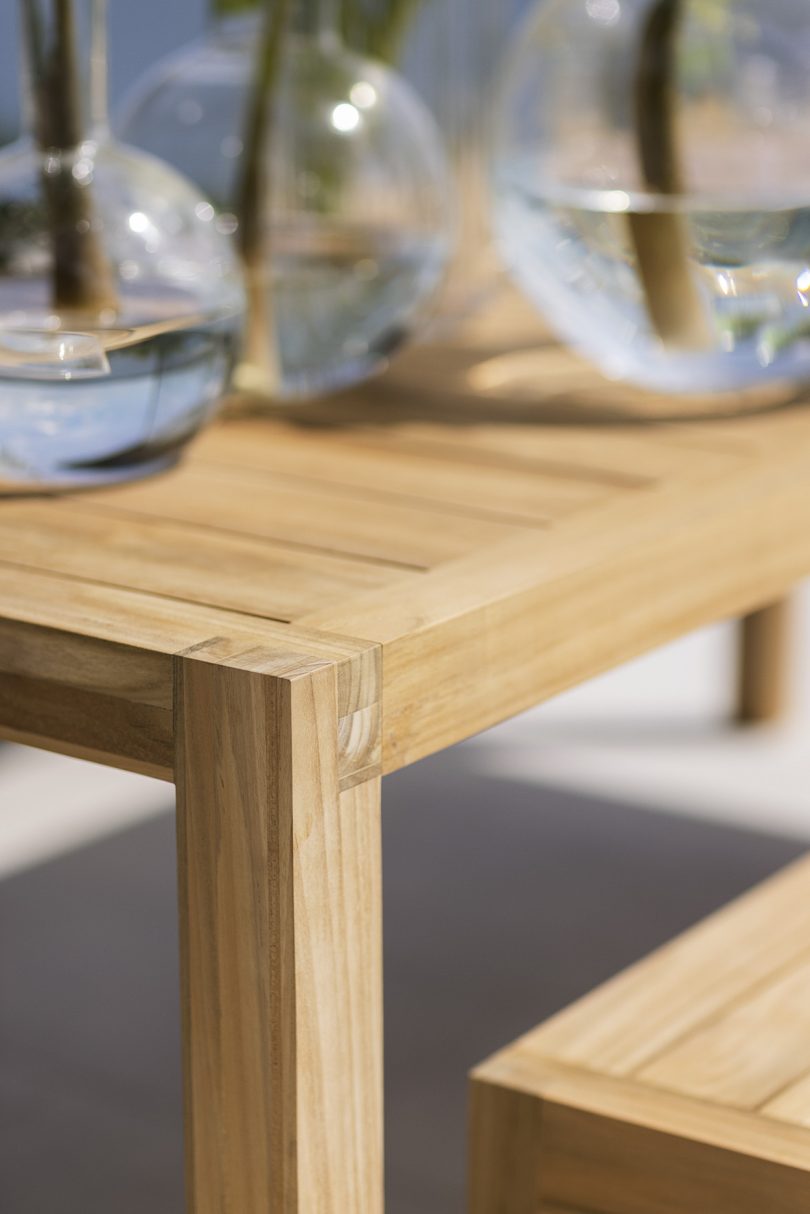 detail of a wooden outdoor table corner