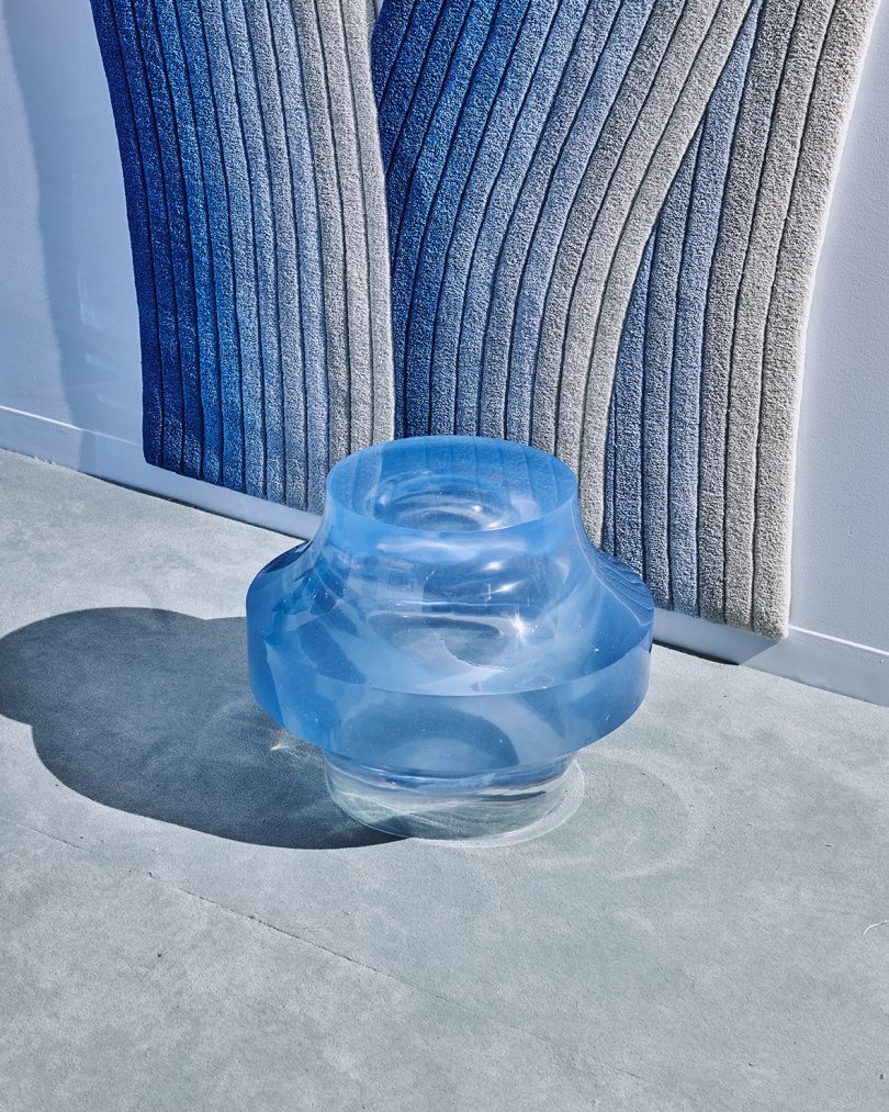 blue object on floor at a blue-themed exhibition