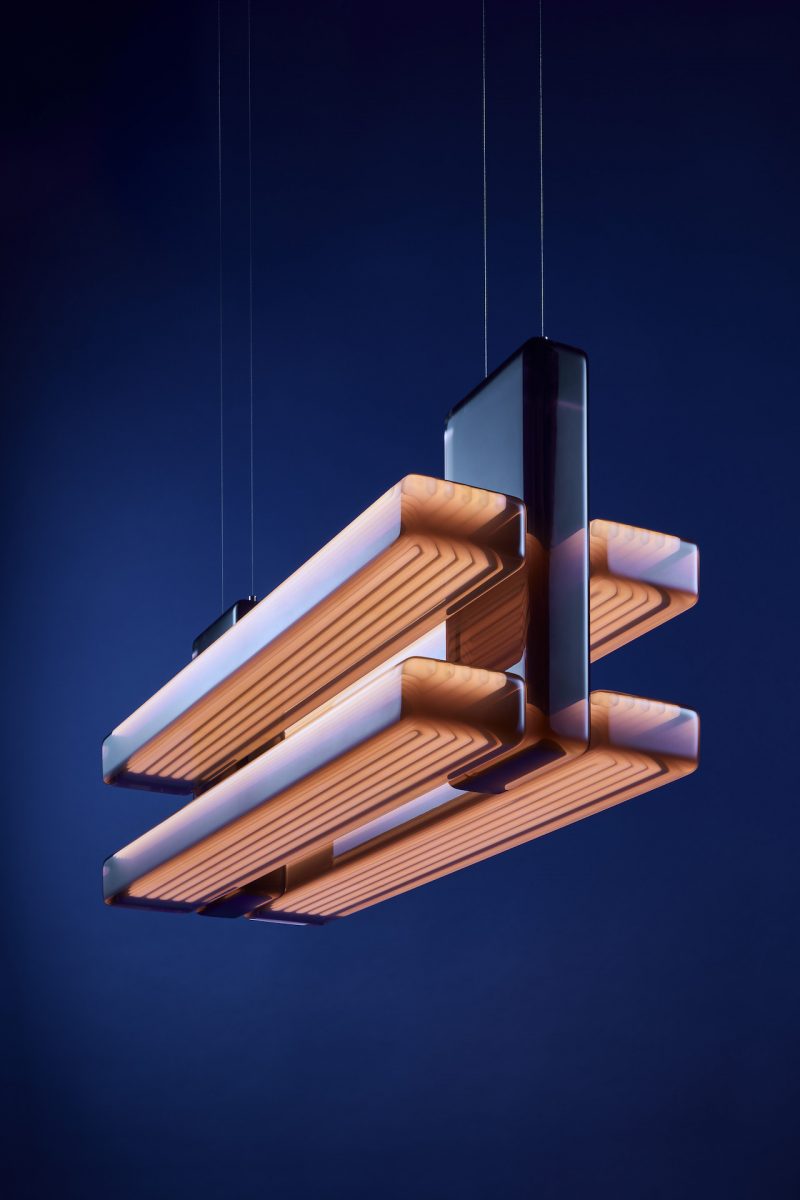 modern pendant light with red ambient glow