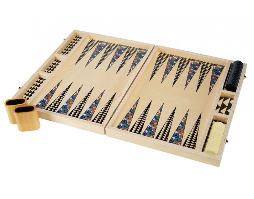 Backgammon set in baltic birch with graphic floral detailing in Soft teal, Bright Blue, Rust, Sky, Black colorway.