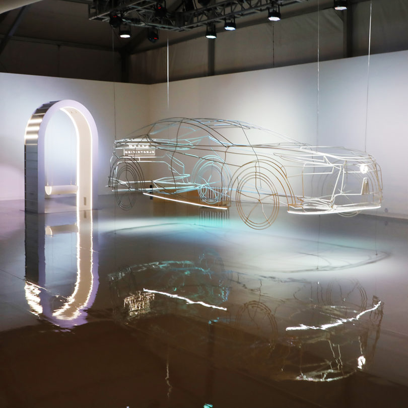 artwork of wire-framed car suspended in midair