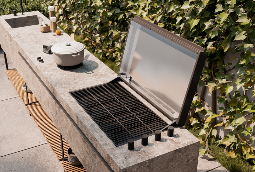 detail of outdoor kitchen setup with grill and sink