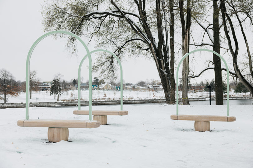 three benches outdoors in the snow