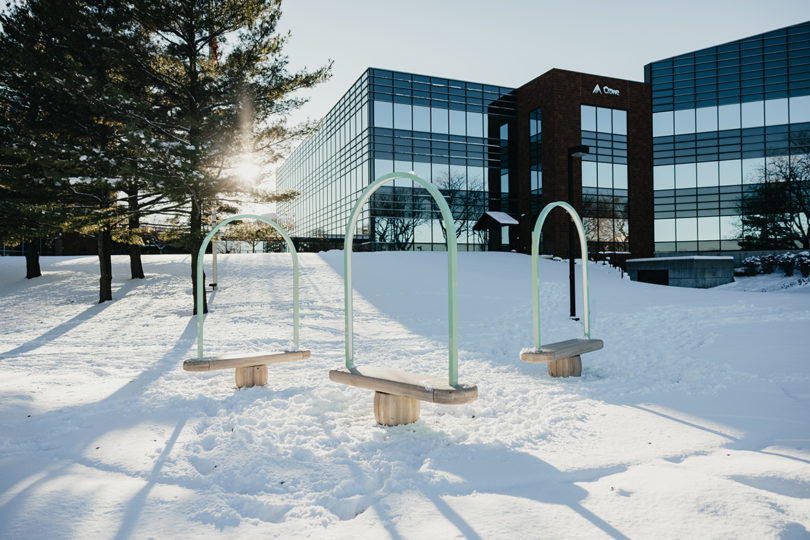 three benches outdoors in the snow