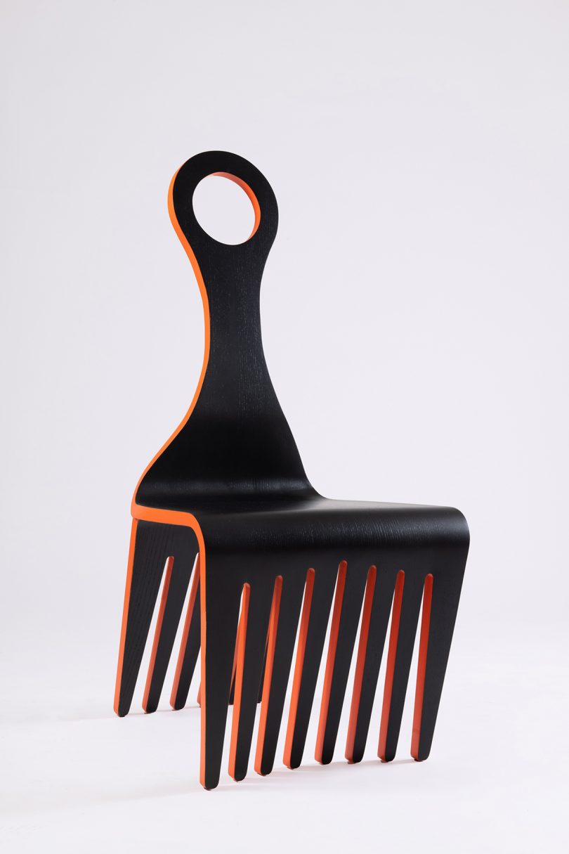 black and orange chair that looks like Afro Comb