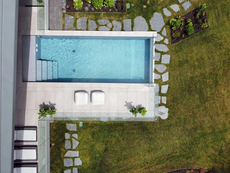 aerial down shot of cantilevered swimming pool