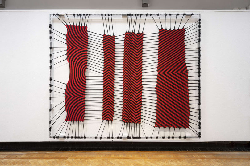 graphic textile art on display at a gallery