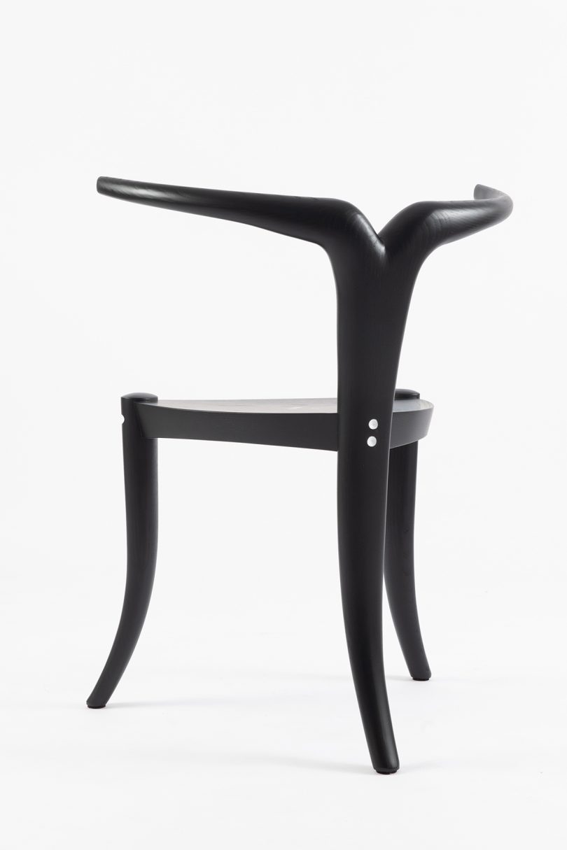 black chair with T-shaped backrest
