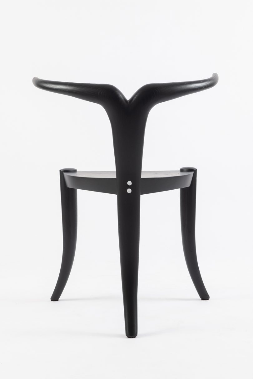 black chair with T-shaped back