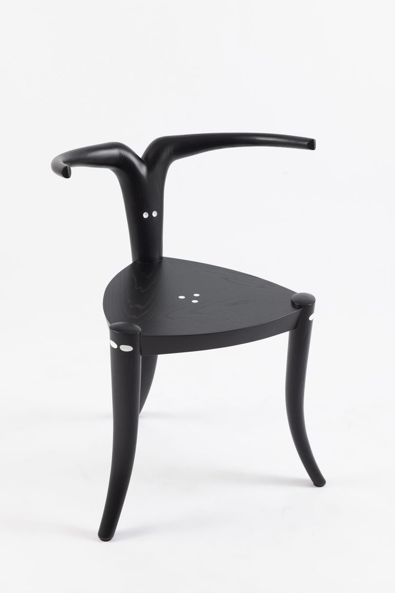 black chair with T-shaped backrest