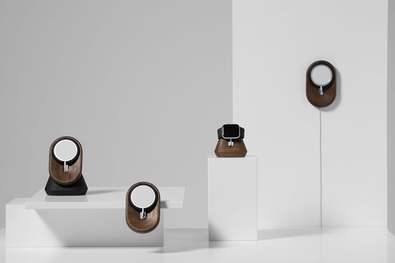 a collection of wood tech accessories that charge the iPhone and Apple Watch