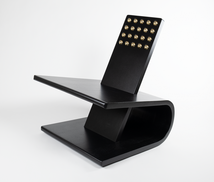 black graphic chair with U-shaped base