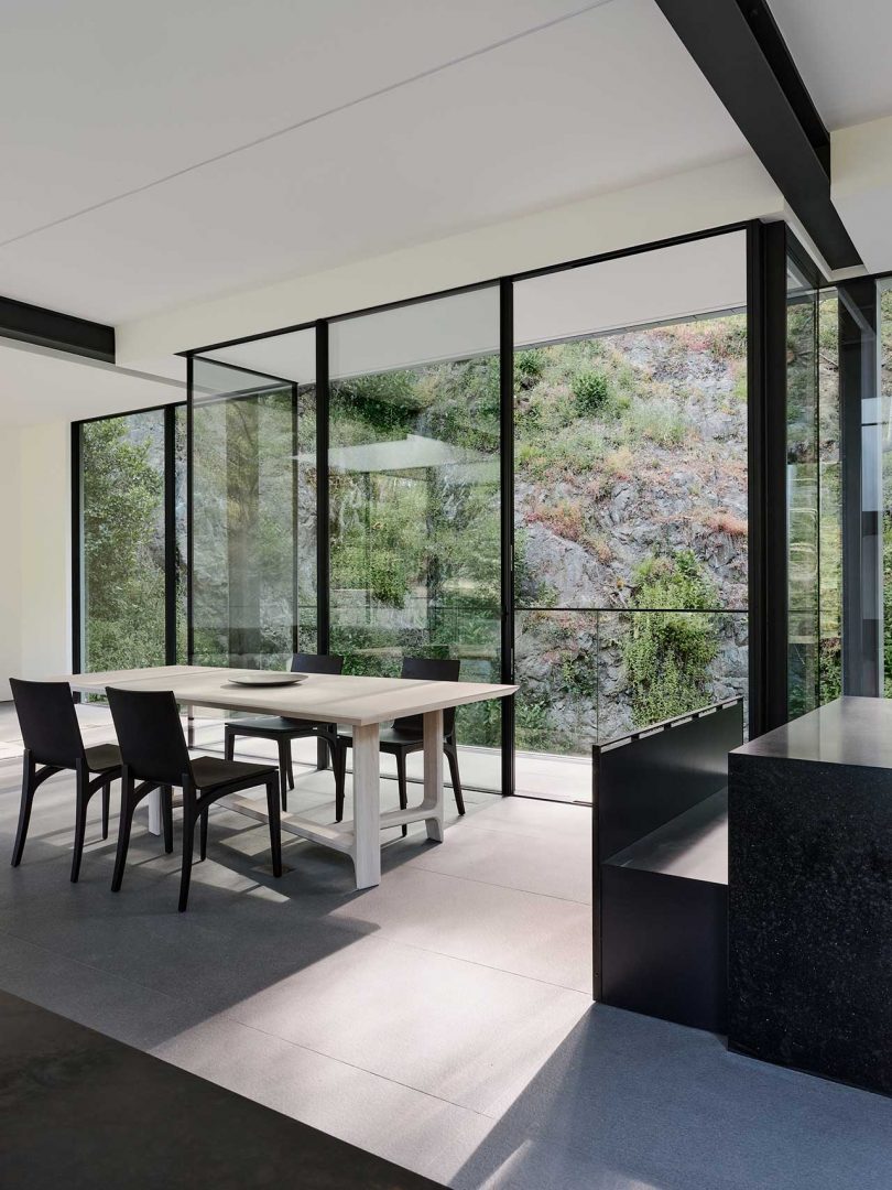 interior view of modern, minimalist house with black and white finishes