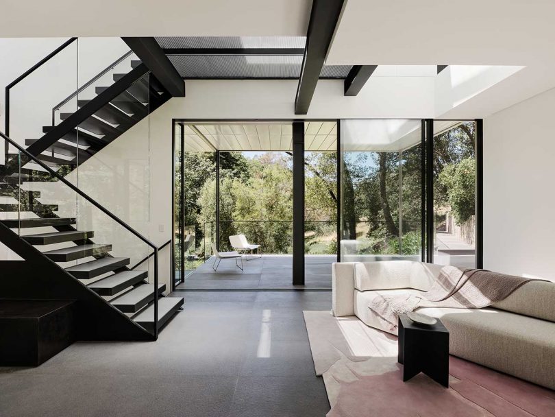 interior view of modern, minimalist house with black and white finishes