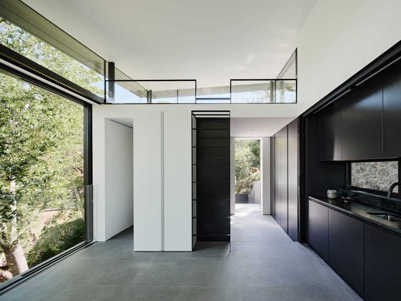 interior view of modern guest house with minimalist black and white interior