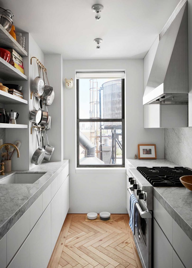 view into small modern galley kitchen in NYC