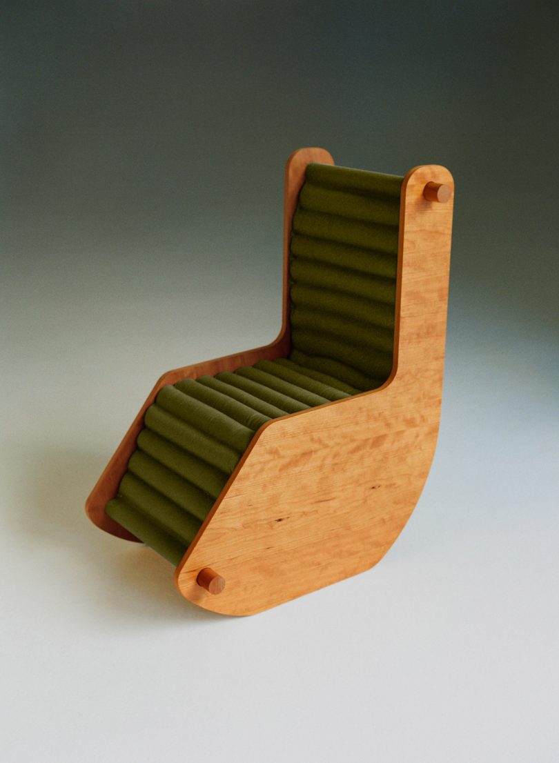 reading chair with green cushion