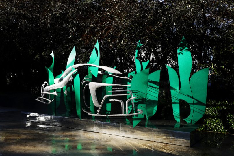 green metal public installation at night