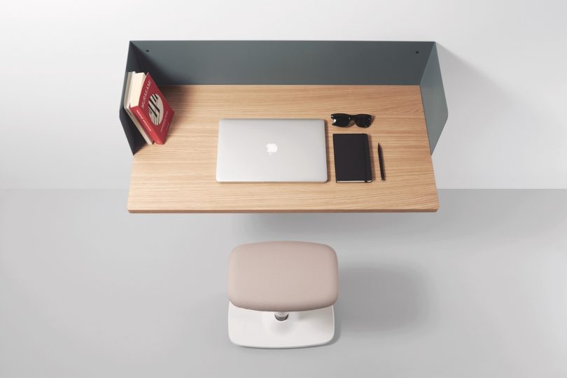grey sheet metal and wood wall desk