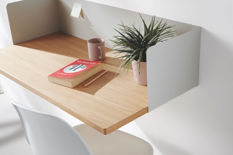 grey sheet metal and wood wall desk