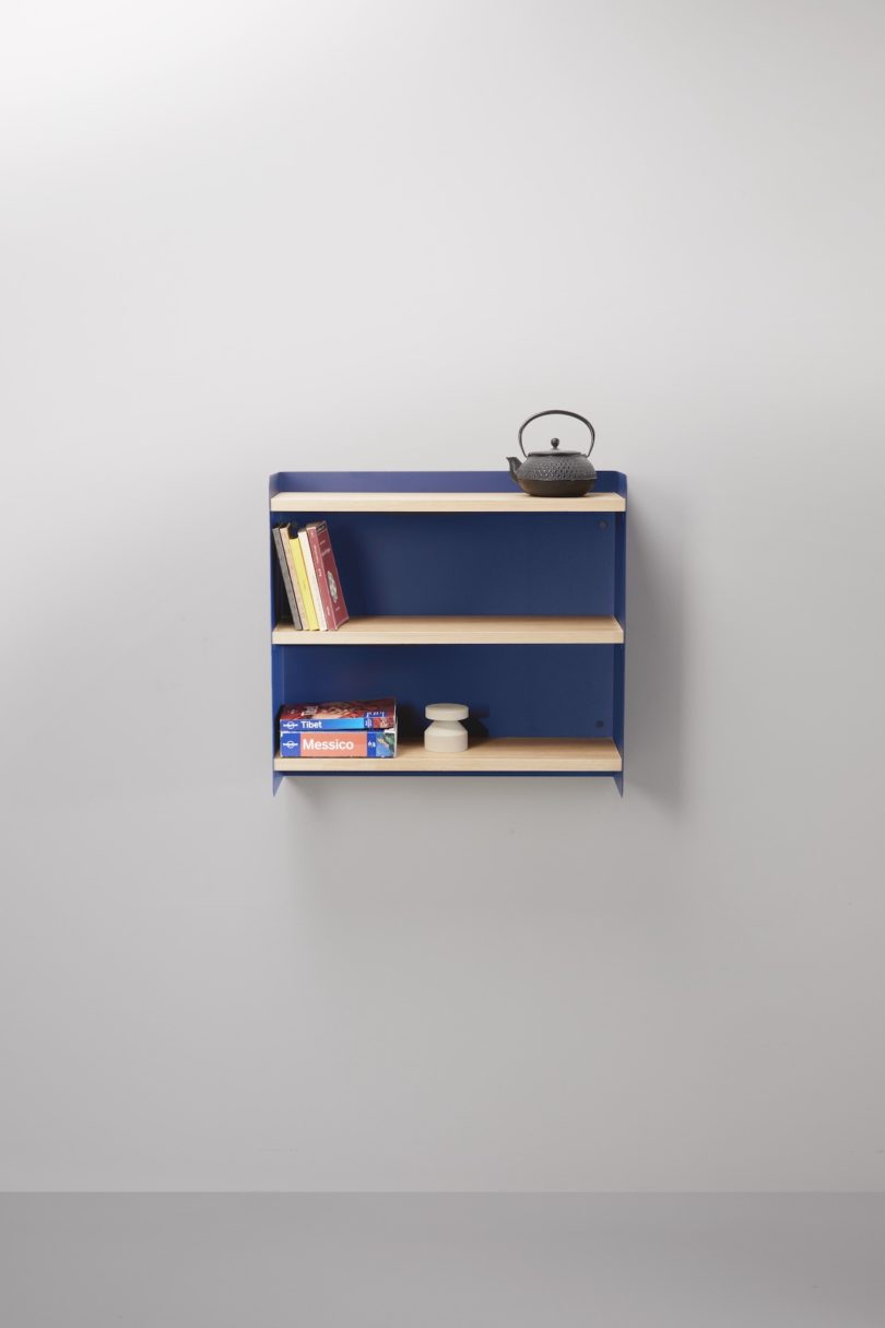 blue sheet metal and wood wall shelf