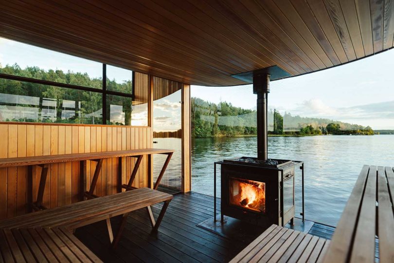 interior of modern wooden floating sauna on water