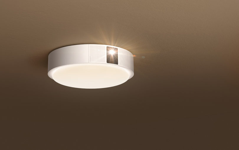 XGIMI Magic Lamp installed onto ceiling, front brightly projected forward.
