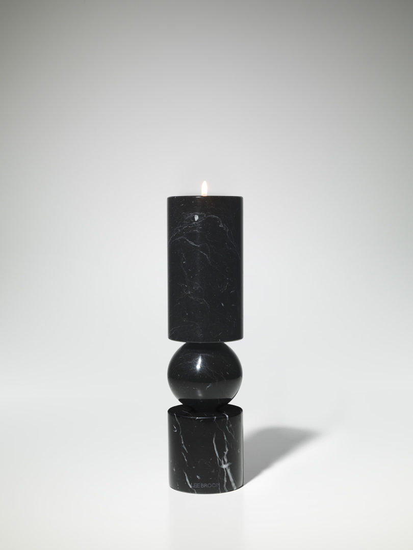 short black marble candlestick on white background