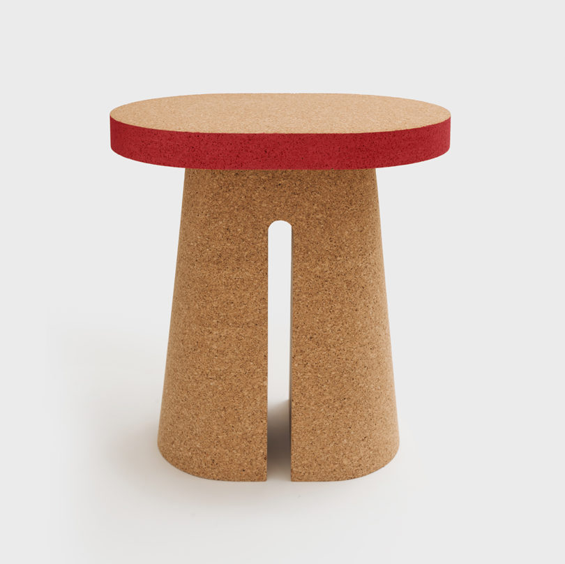 cork side table with red edging