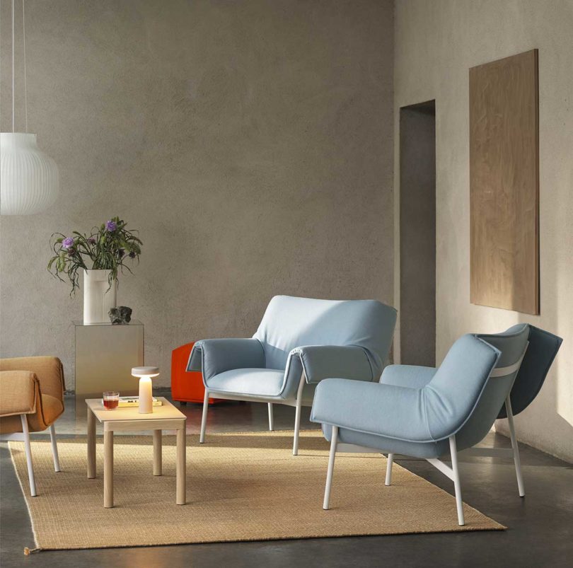 three large pouffy lounge chairs in styled interior space