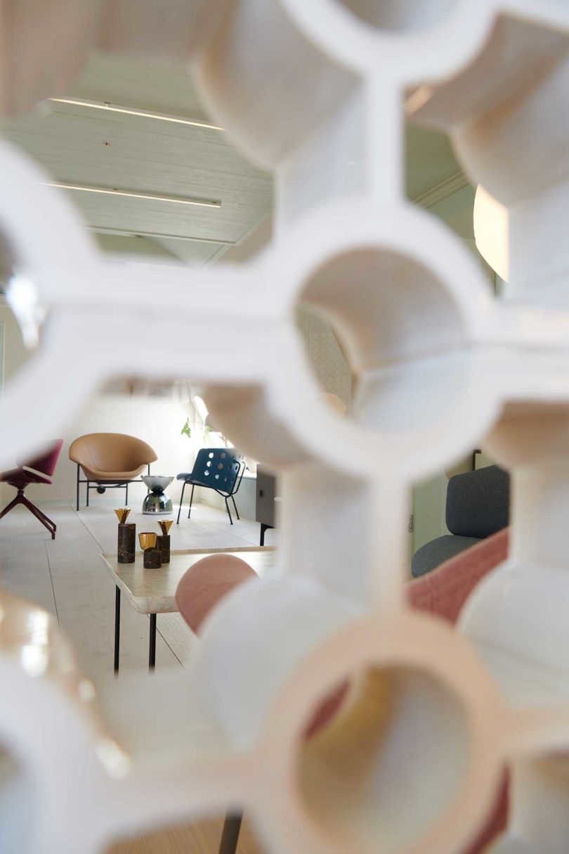 view looking through ceramic space dividers into living space