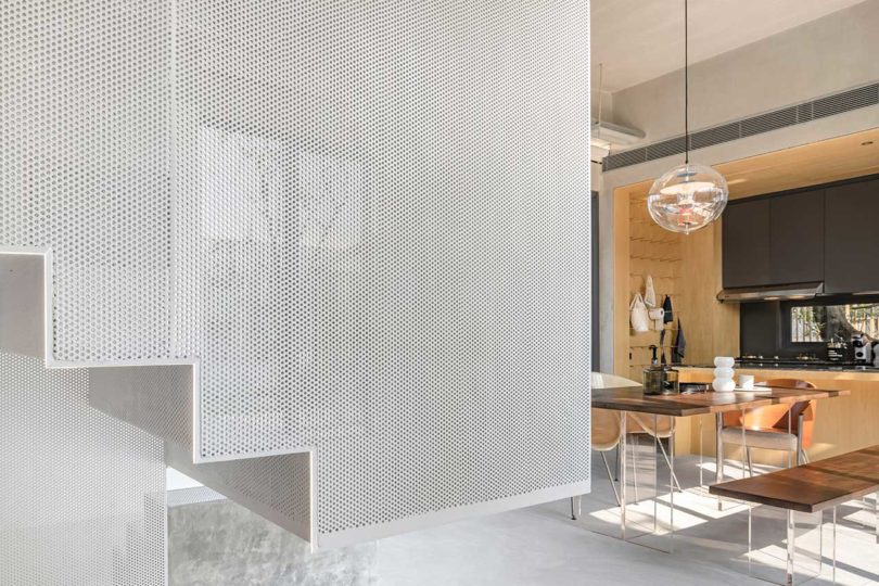 interior shot of modern home closeup of mesh enclosed staircase