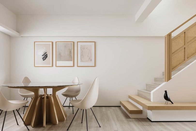 modern dining room interior with Drop chairs and staircase