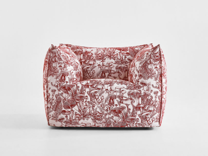 dark red and white mushroom toile upholstered armchair