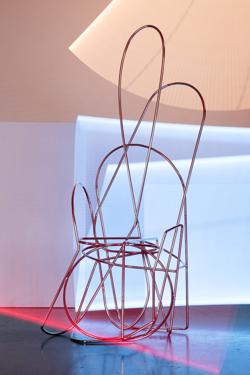 an abstract chair made from hand-bent, welded steel