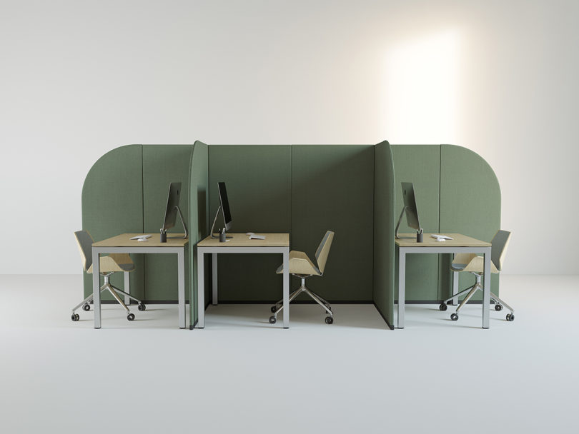 green office wall dividers organized into cubicles