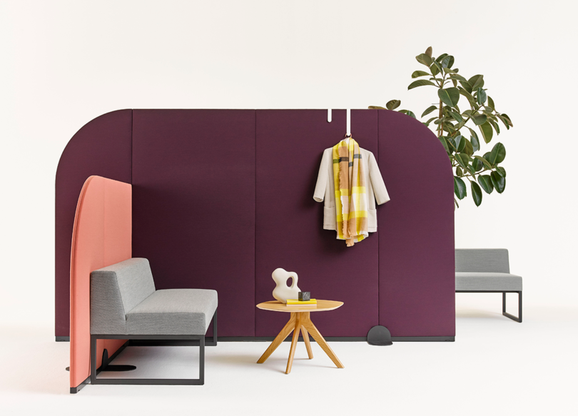 colorful, rounded office wall dividers with bench and side table